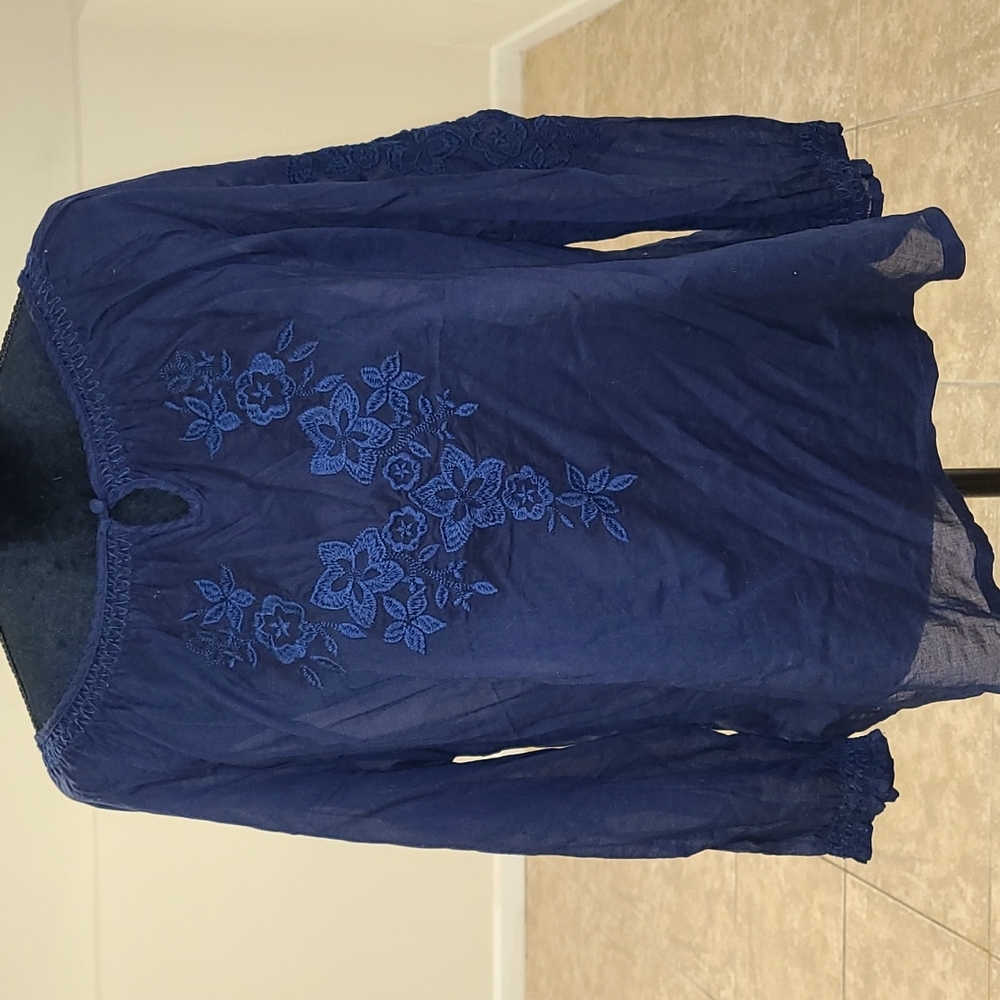 Torrid navy blue embroidered long-sleeved blouse.